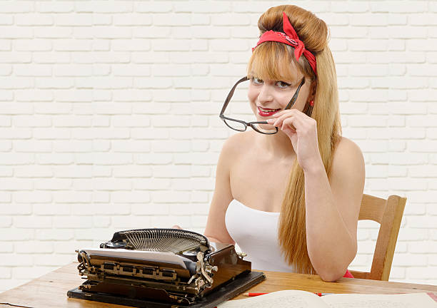 istock pinup girl with typewriter 532966090