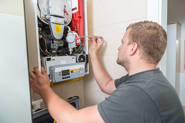 istock Technician repairing Gas Furnace 532966342