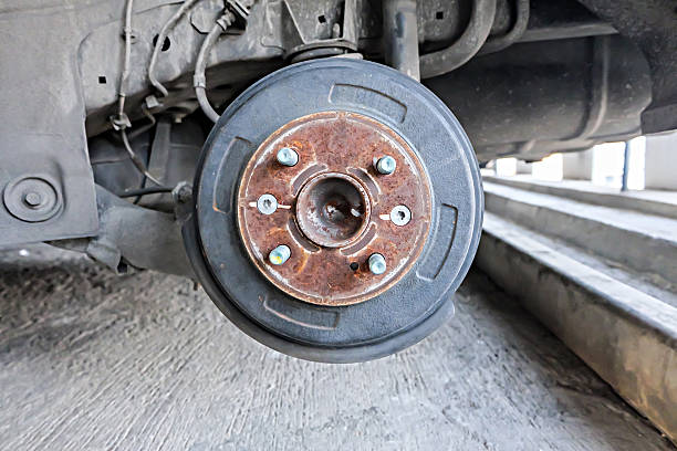 istock Car take wheel off show drum brake assembly. changing tire. 532969854