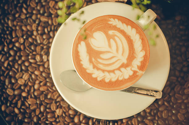 istock Coffee cup in coffee shop - vintage style effect picture 532970036