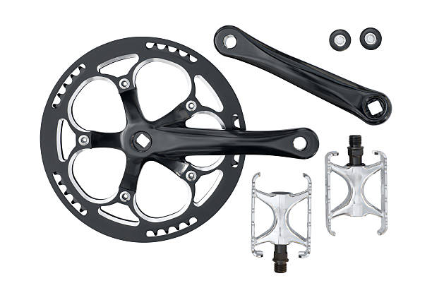 Bike crankset chainring and pedals set Bike crankset chainring and pedals set isolated on white with clipping path chainring stock pictures, royalty-free photos & images