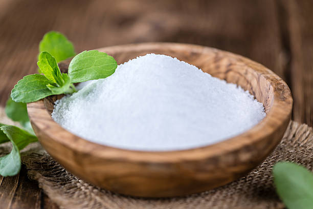 istock Old wooden table with Stevia Granules (selective focus) 532974160