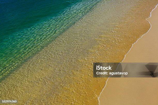 Sunny Idyllic Sandy Caribbean Translucent Beach At Sunrise Stock Photo - Download Image Now