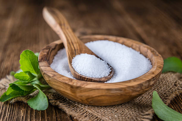 istock Old wooden table with Stevia Granules (selective focus) 532974796