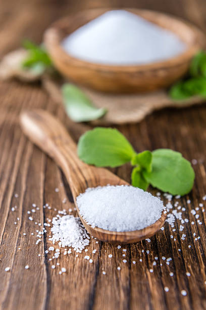 istock Old wooden table with Stevia Granules (selective focus) 532975290
