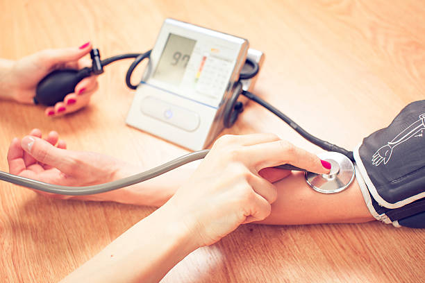 istock Young female doctor or nurse taking  patients 532978392