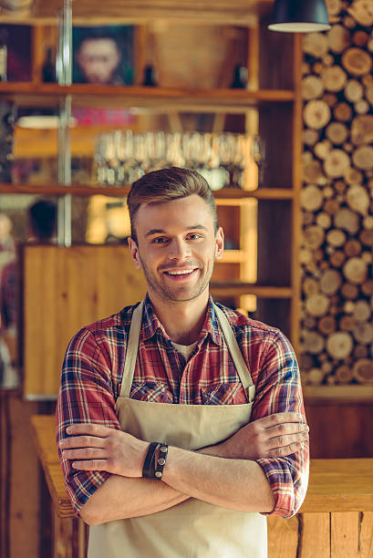 istock Handsome barista at cafe 532979176