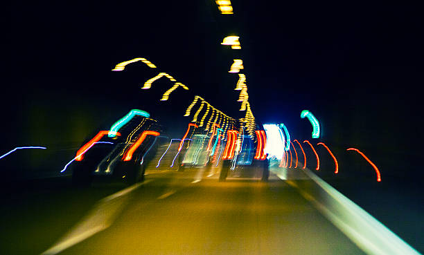 istock traffic lights in the night,light trace on highway 532985829