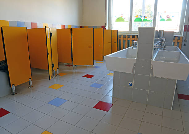 istock bathroom of the nursery school with white ceramic sinks 532986001