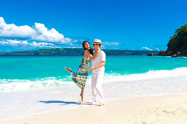 istock young loving couple having fun in the tropical beach 532986725
