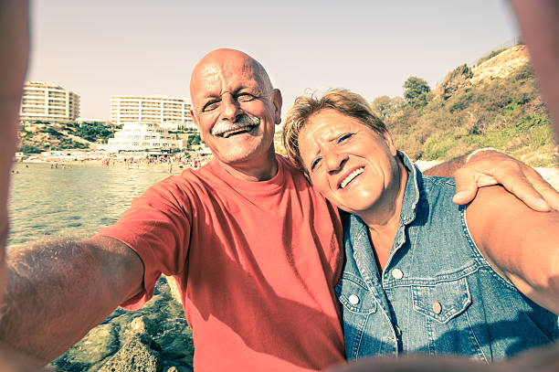 Senior happy couple taking a selfie in Malta