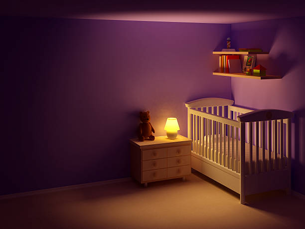 Baby's bedroom with commode and bear at night.  Empty room, night scene