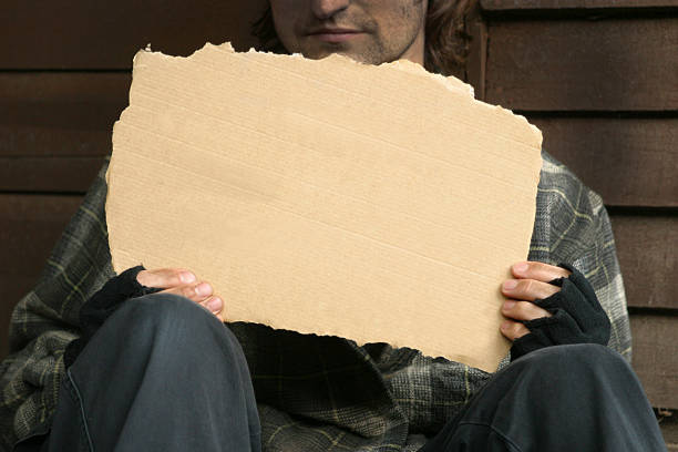 HOMELESS A homeless beggar holding a blank cardboard sign divorcee stock pictures, royalty-free photos & images