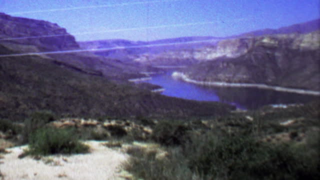 1961: Apache lake reservoir water receding cliff canyon vacation.