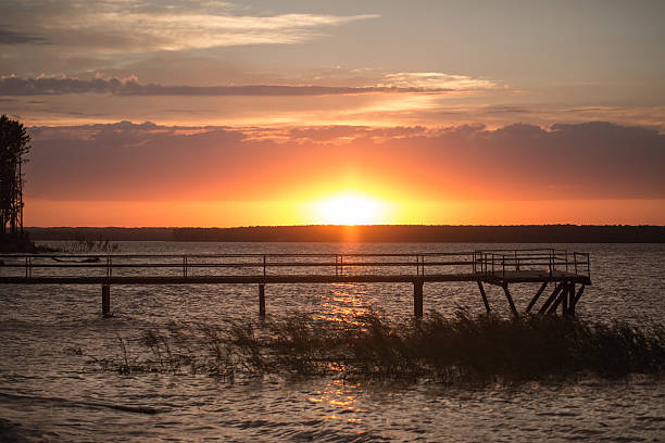 istock Wooden pier at sunset 533028745