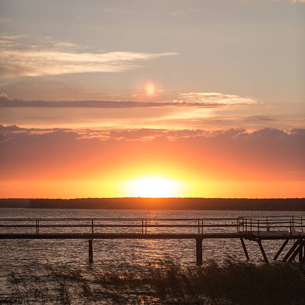istock Wooden pier at sunset 533028749