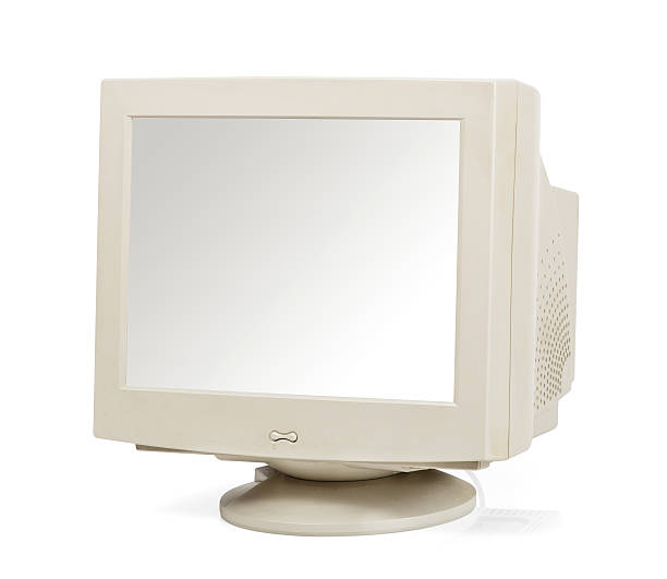 Vintage computer monitor isolated on white Vintage computer monitor with a blank screen viewed at an angle isolated on white crt computer screen stock pictures, royalty-free photos & images