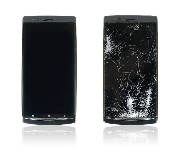 Broken smartphone. Two smartphones. One new and one with broken screen. broken flat screen stock pictures, royalty-free photos & images