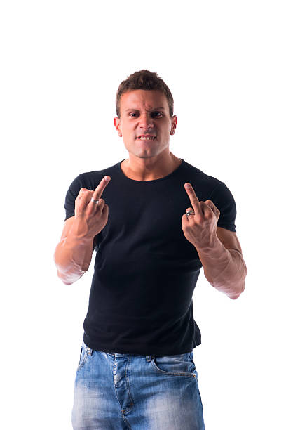 istock Handsome young man showing middle finger 533032323