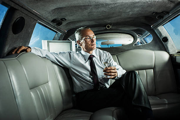 istock Mature businessman in limousine. 533032575