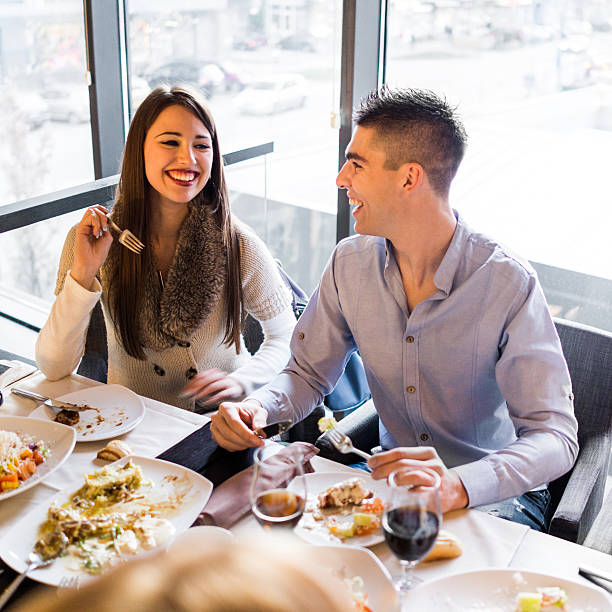 istock Cheerful couple having lunch in a restaurant. 533033019