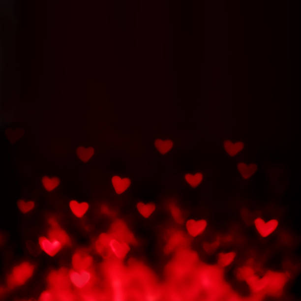 istock Abstract Valentine's day background with red hearts. Glow Colorf 533033723