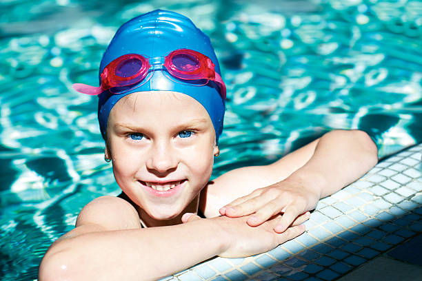 istock young swimmer training in the swimming pool 533035131
