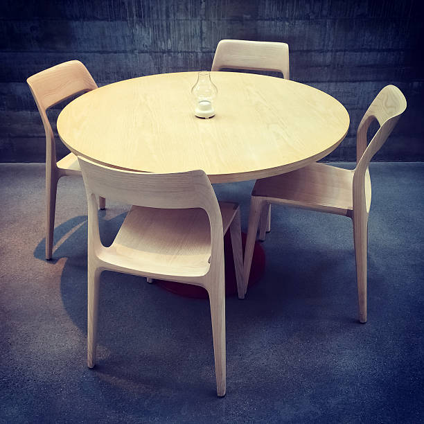 istock Wooden table and chairs in a dark room 533035397