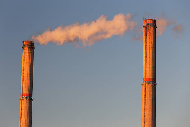 istock Industrial scenery with smoke from coal powered plant 533036117