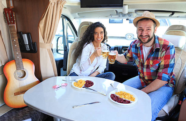 istock Young couple cheering inside of a caravan 533043390