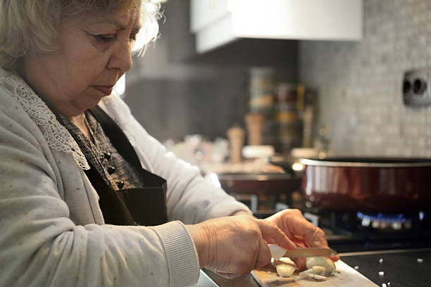 istock Senior woman cooking in kitchen 533043430