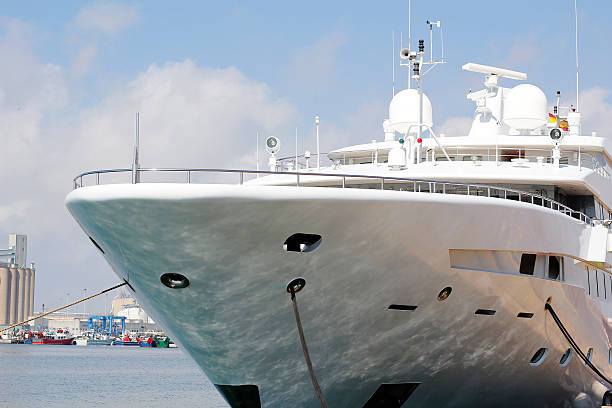 Luxury yacht at harbor stock photo