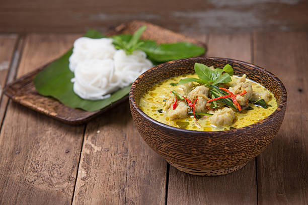 istock Green curry fish balls with fermented rice flour noodles. 533048152