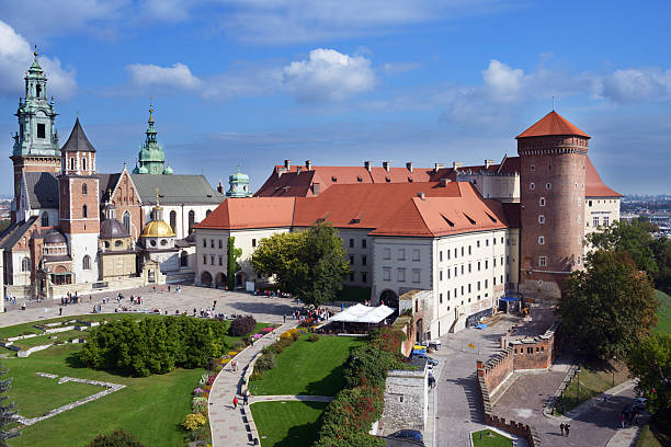 Wawel castle, Krakow, Poland Krakow, Poland - September 15, 2013: Tourists in the Wawel royal castle. Built in the XVI century, now the castle is the museum and the main attraction of the city wawel cathedral stock pictures, royalty-free photos & images