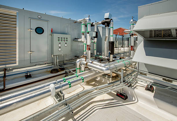istock Insulated Pipes and Filtration Units for Rooftop HVAC 533048792