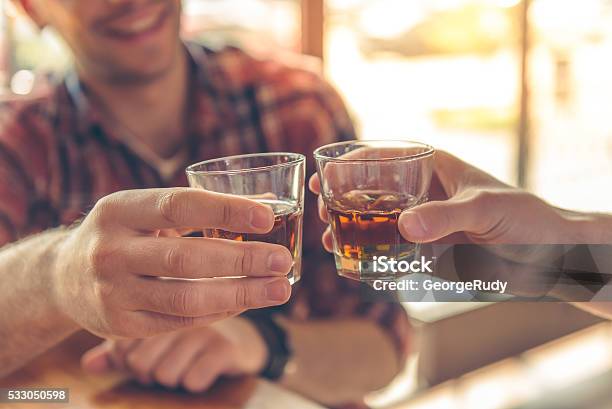 Friends In The Cafe Stock Photo - Download Image Now - Whiskey, Drinking, Men