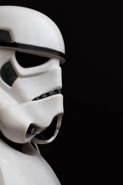 Star Wars Stormtrooper York, UK - May 22, 2016. The profile of a Star Wars, New Order Stormtrooper from The Force Awakens movie. militant groups photos stock pictures, royalty-free photos & images