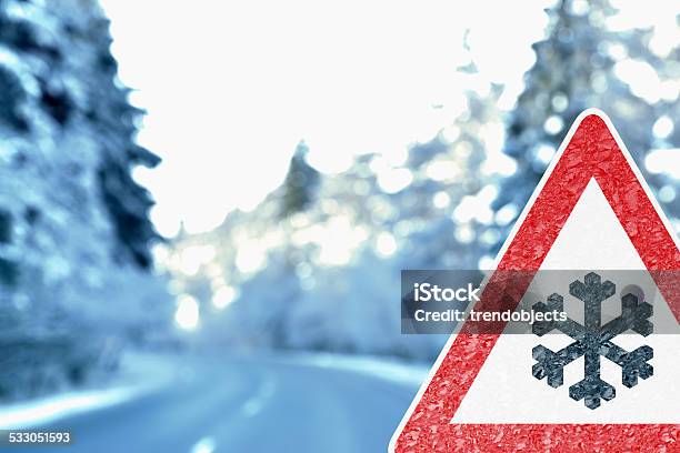 Abstract Winter Driving Background With Warning Sign Stock Photo - Download Image Now