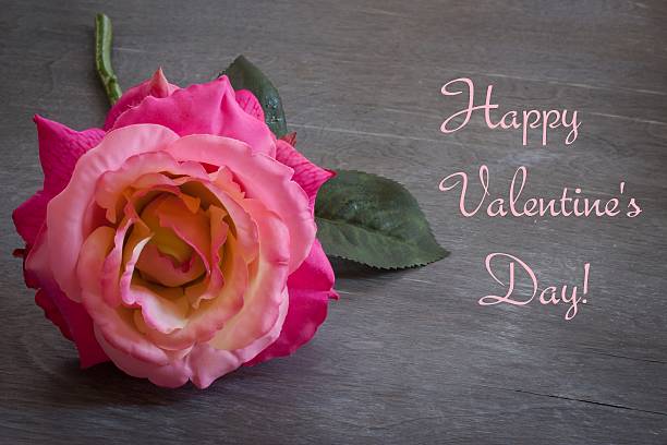 istock Valentines day card with rose and words 533052093