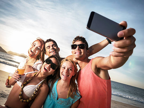 istock Friends taking a selfie on the beach. 533052111