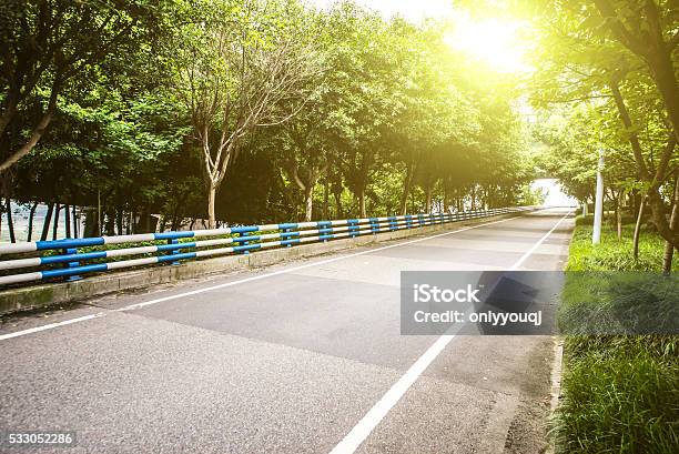 Empty Road Near Modern Building Stock Photo - Download Image Now - Agricultural Field, Asphalt, Backgrounds