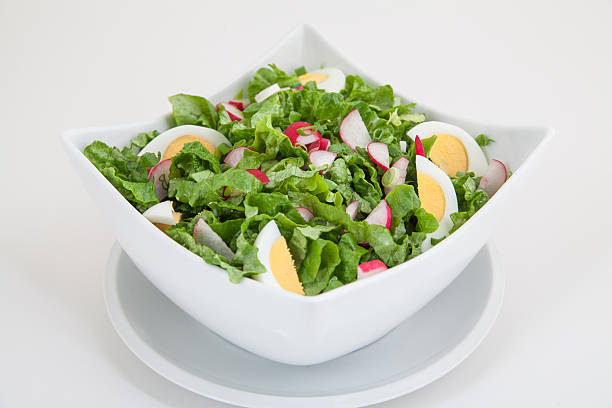istock Green salad with eggs and radishes 533053413
