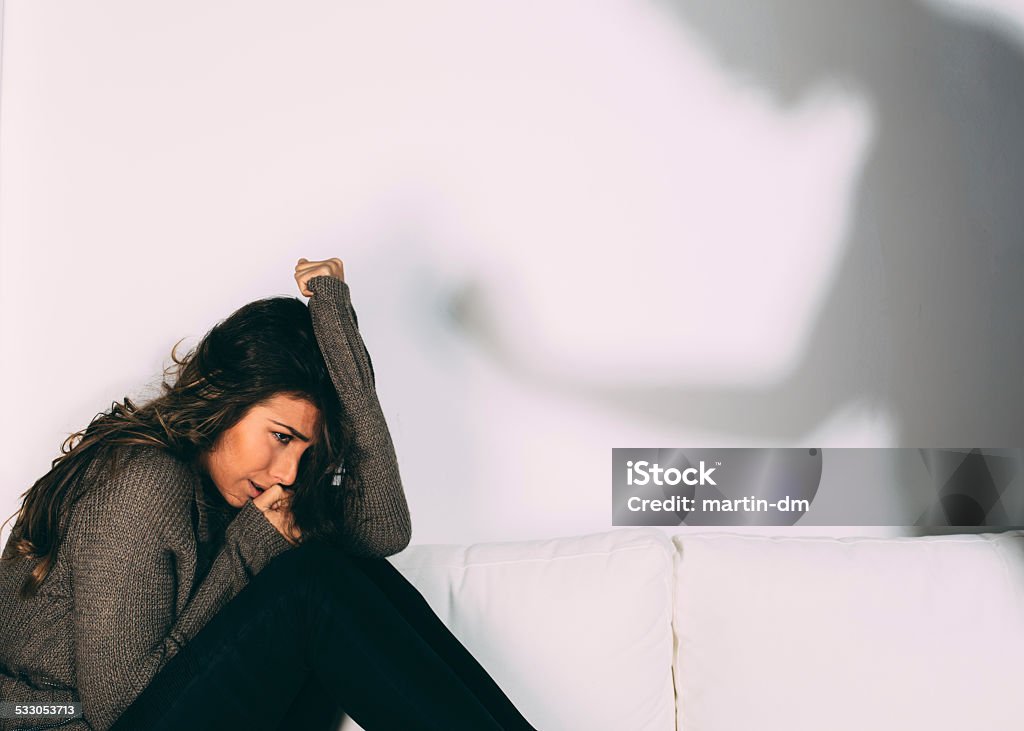 Domestic violence against women Studio shooting - copyspace Domestic Violence Stock Photo