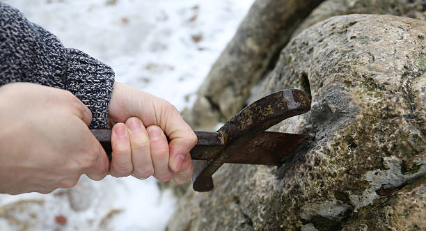 istock Excalibur sword in the stone 533058984