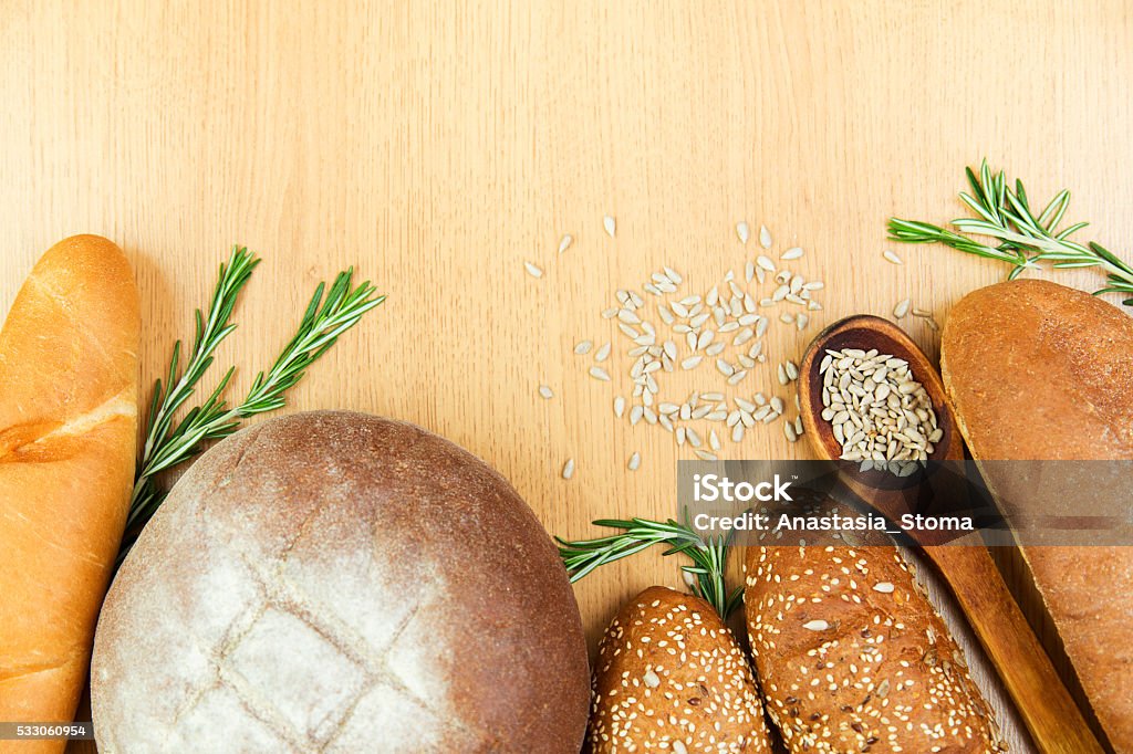 fresh home-baked bread fresh home-baked bread on a wooden board Arrangement Stock Photo