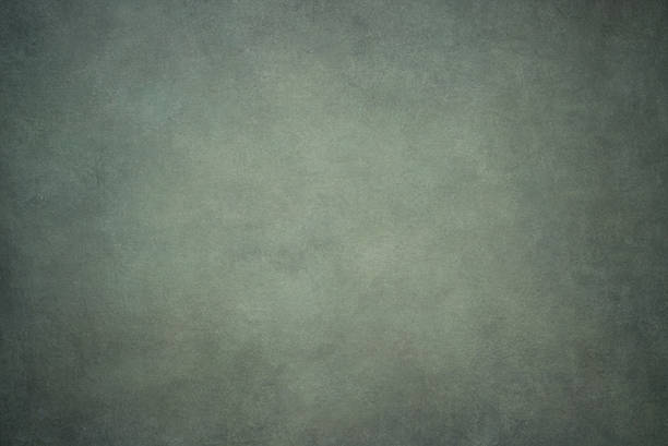 istock Gray green painted canvas or muslin fabric cloth studio backdrop 533061330