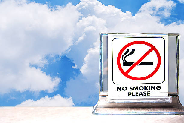 istock no smoking sign over cloudy sky. 533063918
