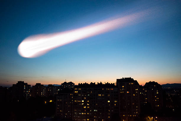 istock Comet over the nigt sky city landscape 533065468