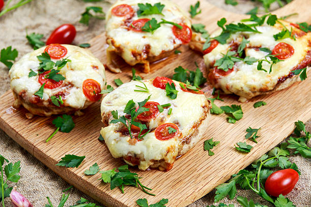istock Cooked Mushrooms stuffed with cheese and plum tomatoes 533066546