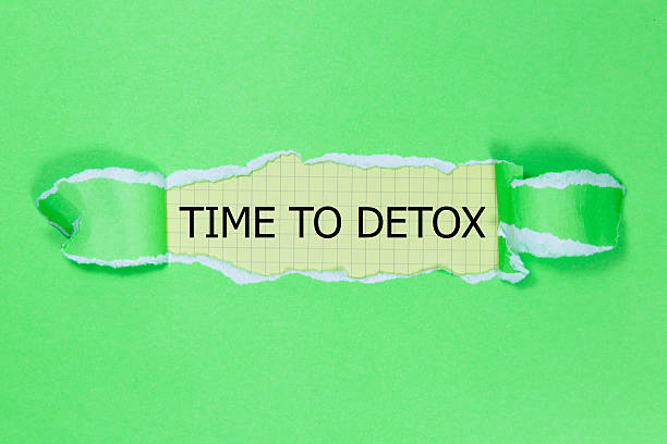 istock time to detox written under torn paper 533066936